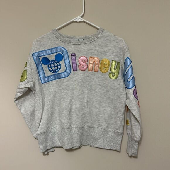Walt Disney world Stitched Pastel Satin Letter Crewneck Disney Parks Sweatshirt - Picture 1 of 8